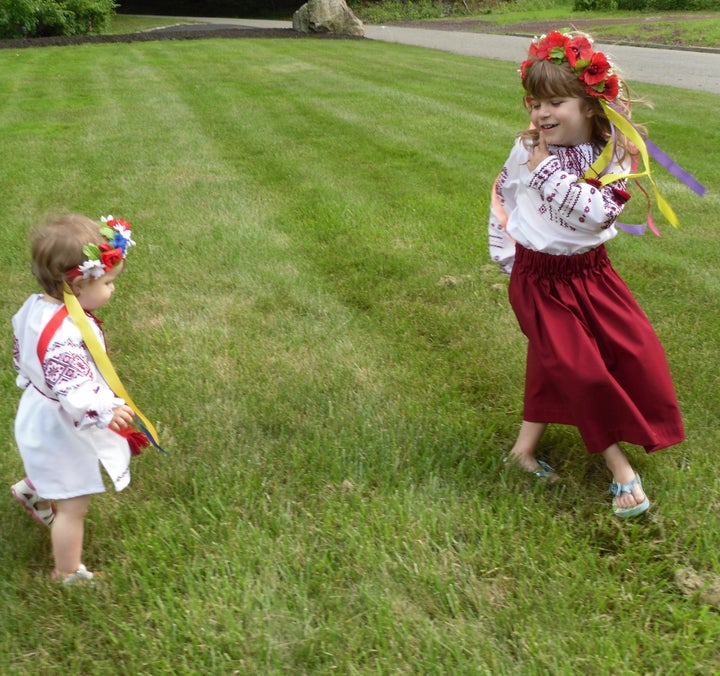 <p>Remembering the roots: Maggie and Anna wearing Ukrainian blouses </p>