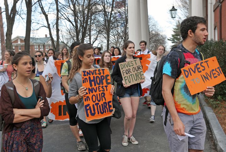Students and alumni calling for divestment at Tufts University in Medford, Mass., in 2015. The divestment movement began in 2011 on the campuses of U.S. universities and colleges. 