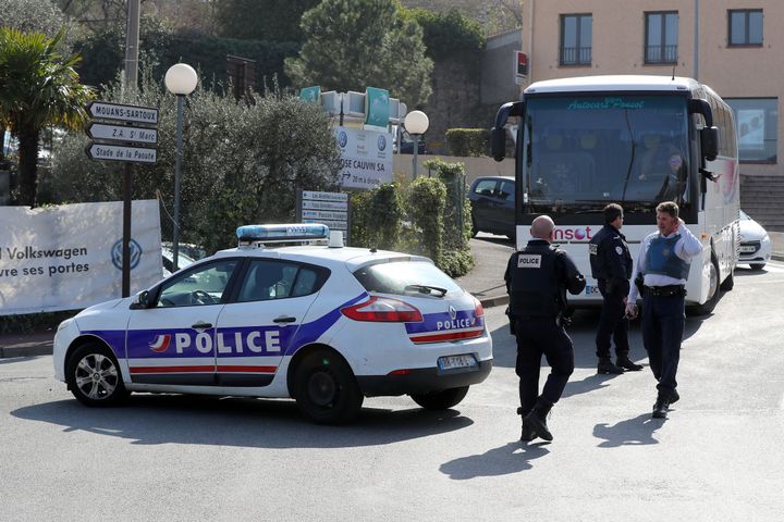 Police officers control traffic near the Tocqueville high school in Grasse, southwestern France, after a shooting occured in the school on March 16, 2017.