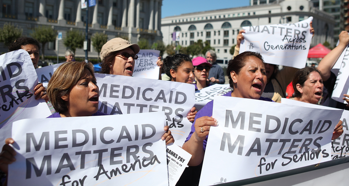 Georgia residents protest in support of Medicaid.