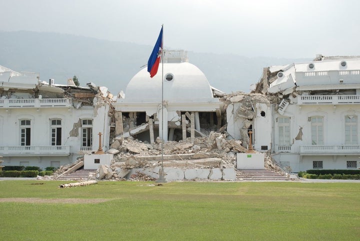 Haiti's Presidential Palace weeks after the January 2010 earthquake that killed up to 350,000. The resulting cholera epidemic continues to kill over 10,000 at last reports. To me this is symbolic of 200 years of foreign occupation of Haiti and what it wrought. This building is gone now, and and an opaque green fence surrounds the Presidential grounds.The people cannot see what does not remain.