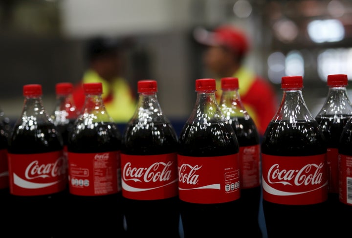 Five of the top soft drinks companies sell over 2 million tons of plastic bottles each year. They use a combined average of j