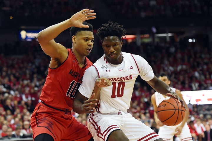 Wisconsin forward Nigel Hayes (right) is among the current and former college athletes who have sued the NCAA over compensation.