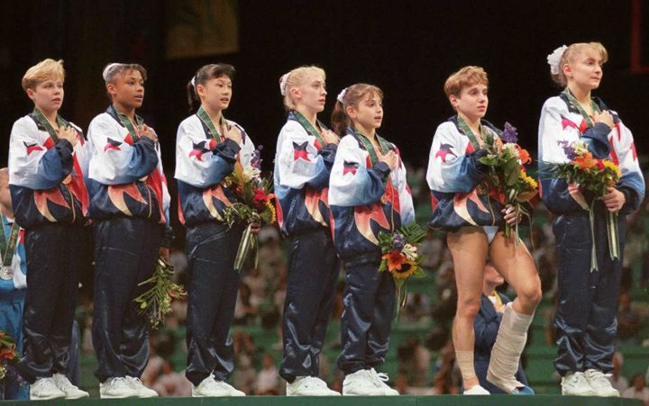Nassar was a physician for the USA Women's Gymnastics team during the 1996 Olympics. This is 1996 Women's USA team singing the national anthem after they won gold. 