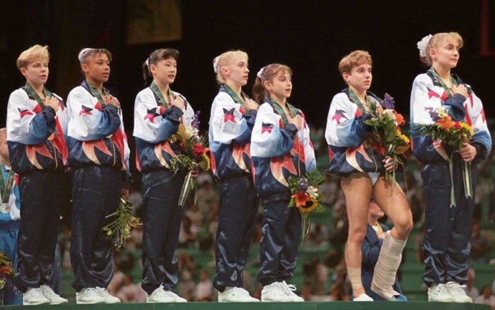 Nassar was a physician for the USA Women's Gymnastics team during the 1996 Olympics. This is 1996 Women's USA team singing the national anthem after they won gold.