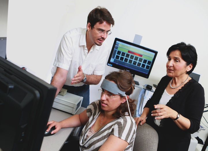 Hasan Ayaz (left) and Banu Onaral (right), both professors at Drexel’s School of Biomedical Engineering, Science and Health Systems, say they're excited because the wearable headband will let them study real-life interactions.