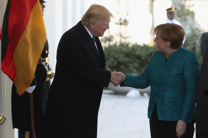 Trump and Merkel earlier in the day