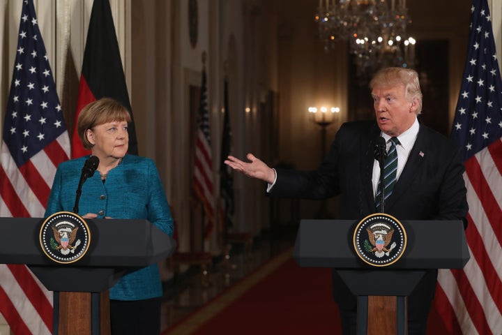 President Donald Trump holds a joint press conference with German Chancellor Angela Merkel in the East Room of the White House on Friday in Washington. The two leaders discussed strengthening NATO, fighting the Islamic State group, the ongoing conflict in Ukraine and held a roundtable discussion with German business leaders during their first face-to-face meeting.