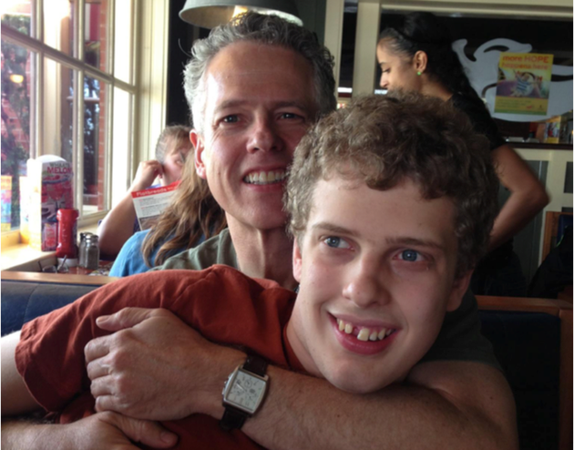 Luke, pictured here with his father Jeff Perkins,&nbsp;was at the center of a disability rights