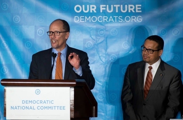 Tom Perez speaks as Keith Ellison looks on
