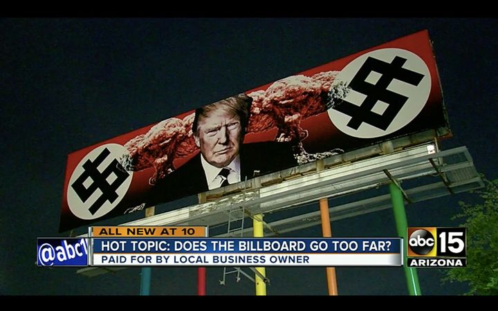 This anti-Trump billboard in Arizona has drawn heated opinions about its design, some who say its Nazi imagery goes too far.