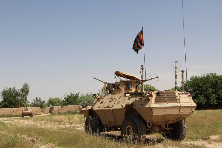 A military vehicle patrols in the Babaji area of Lashkar Gah Helmand province, Afghanistan May 8, 2016.