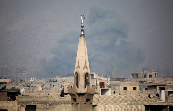 Smoke billows following a reported air strike in the rebel-held parts of the Jobar district, on the eastern outskirts of the
