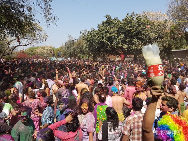 During Holi, the spring festival in India, a drug called bhang is tacitly accepted for use. The bottle in the right side of t