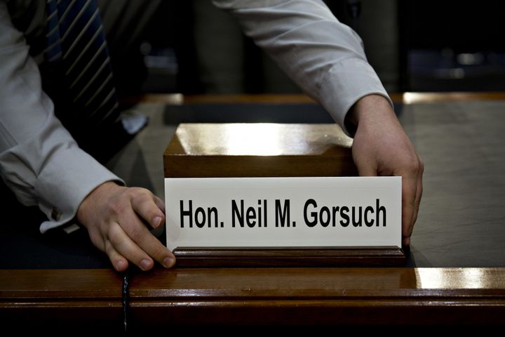 The name placard for Neil Gorsuch, U.S. Supreme Court nominee for U.S. President Donald Trump, is placed on a witness table before a Senate Judiciary Committee confirmation for Gorsuch in Washington, D.C., U.S., on Monday, March 20, 2017. (Photographer: Andrew Harrer/Bloomberg via Getty Images)