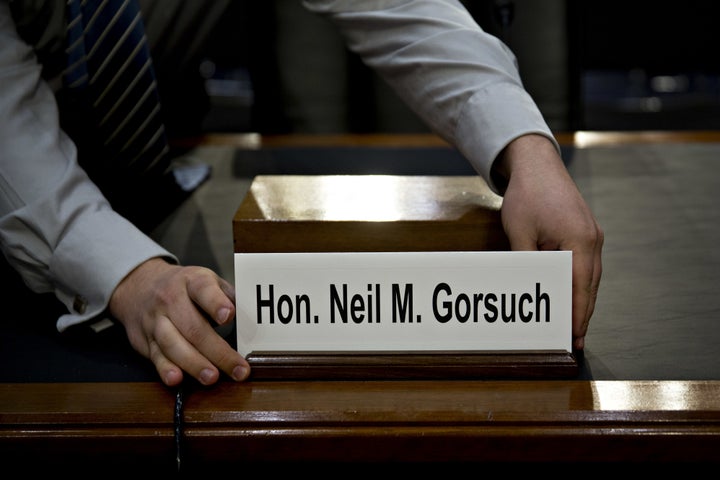 The name placard for Neil Gorsuch, U.S. Supreme Court nominee for U.S. President Donald Trump, is placed on a witness table before a Senate Judiciary Committee confirmation for Gorsuch in Washington, D.C., U.S., on Monday, March 20, 2017. (Photographer: Andrew Harrer/Bloomberg via Getty Images)