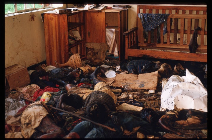 Bodies and wreckage lie on the floor of a room May 5, 1994, in Rukara, Rwanda. Hundreds of Tutsis were killed at the Rukara C