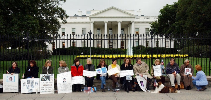 Families of 9/11 victims protest the handling of the investigation of the 9/11 attacks, Oct. 2002. 