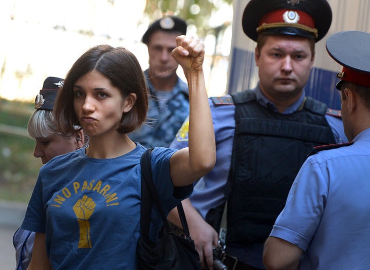 Tolokonnikova gestures before a court hearing in Moscow in 2012.