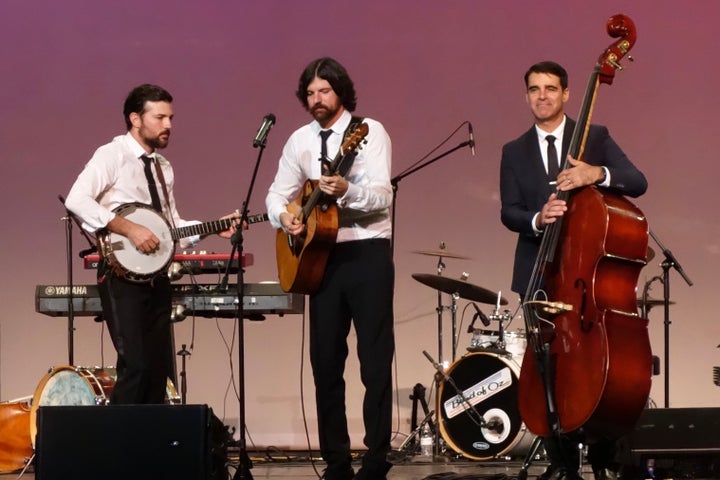 Scott Avett, Seth Avett, and Bob Crawford at the North Carolina Music Hall of Fame Induction Ceremony, Kannapolis, North Carolina (October 20, 2016).