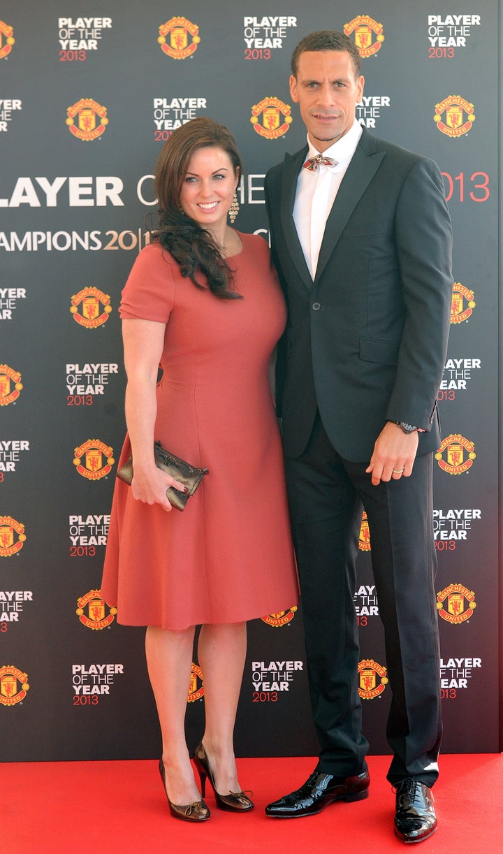 Manchester United's Rio Ferdinand with wife Rebecca Ellison arrive for the Manchester United Player of the Year Awards at Old Trafford, Manchester, May 2013.