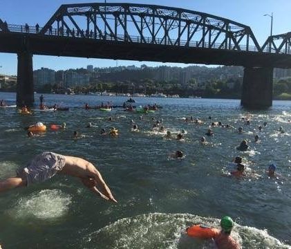 Celebrating a cleaner Willamette River in downtown Portland, Oregon with a community swim, August 2016.