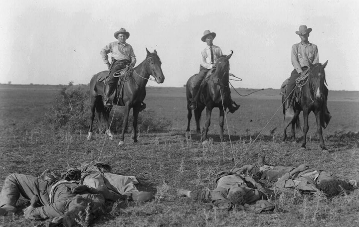 Texas Rangers mounted on horses in 1915.