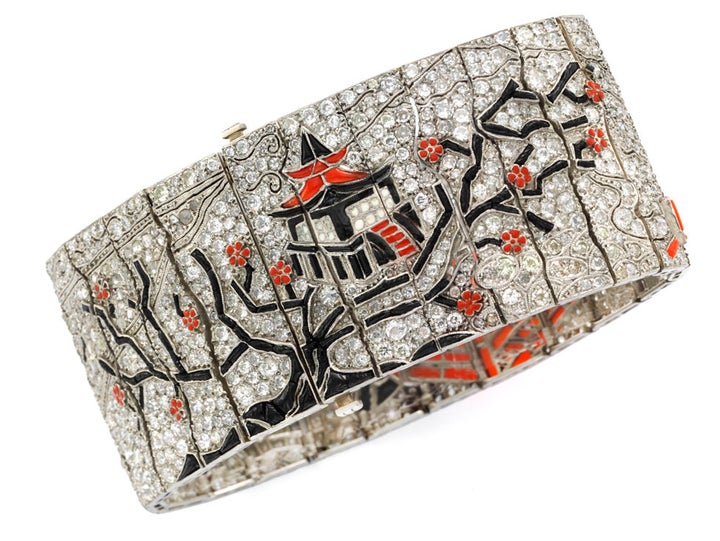 <p>Simon Teakle’s Lacloche Freres<em> Art Deco Chinoiserie bracelet, of narrative style depicting a garden scene set with diamonds, black onyx and enamel mounted in platinum,</em> <em>1927. </em></p>