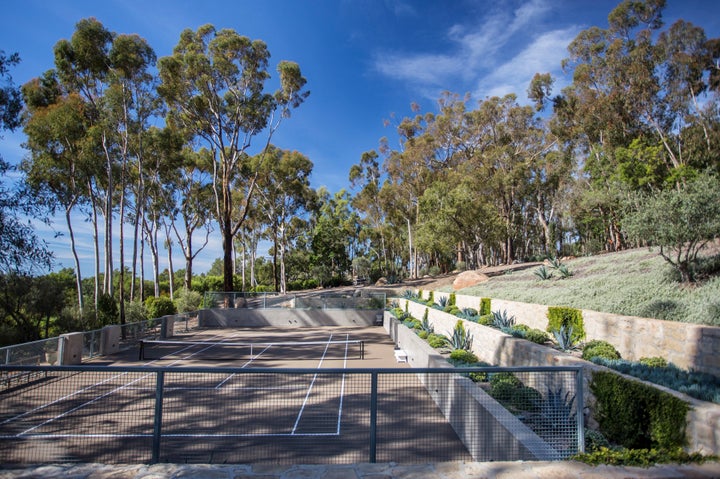 Ellen added on the tennis court after purchasing the property.