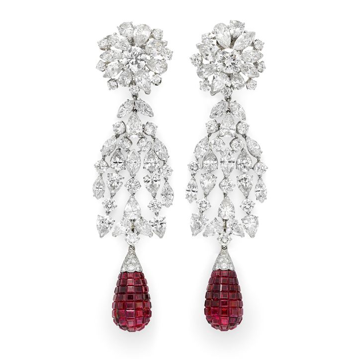 Simon Teakle’s Van Cleef & Arpels’  platinum ruby and diamond earrings with a flexible cascade of circular, pear and marquise cut diamonds suspending a central invisibly set ruby drop, three components detachable to wear in four different ways.New York circa 1930s. 