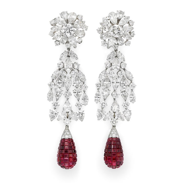 <p>Simon Teakle’s Van Cleef & Arpels’ <em> platinum ruby and diamond earrings with a flexible cascade of circular, pear and marquise cut diamonds suspending a central invisibly set ruby drop, three components detachable to wear in four different ways.</em>New York circa 1930s. </p>