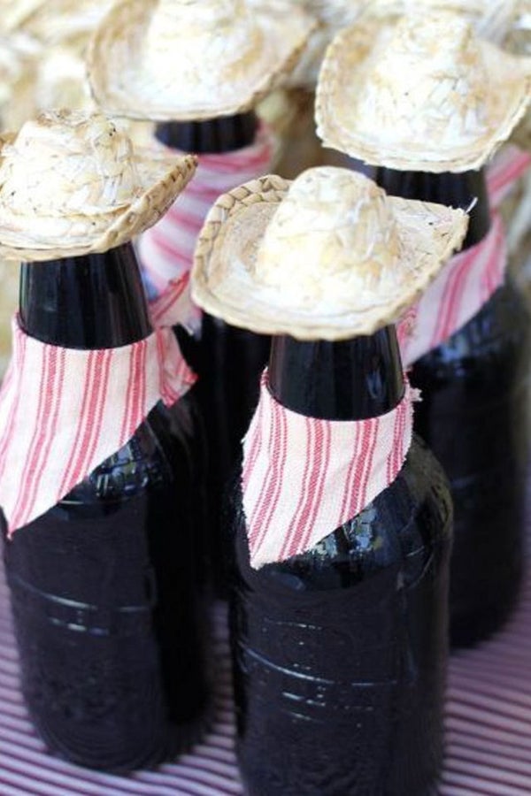 11 Country Themed Party Ideas That Are Perfect For The Acm Awards 2 Dress The Beverage Bottles Up As Cowboys