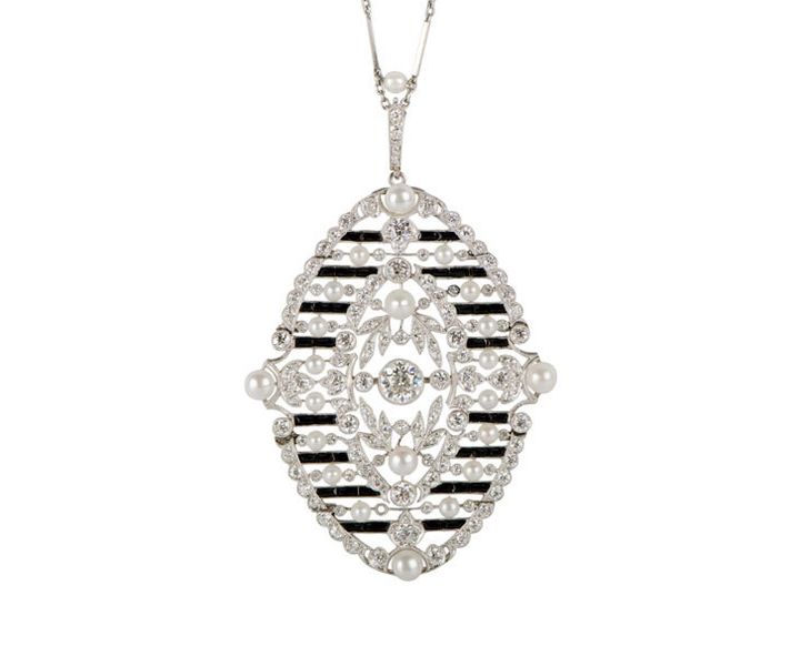 M. Khordipour’s Edwardian platinum, onyx, diamond and seed pearls pendan on platinum chain.