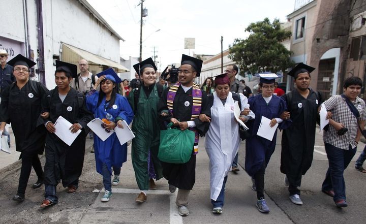“Dream 9” immigration rights activists in July 2013, wearing their school graduation caps and gowns to show their desire to finish school in the U.S.