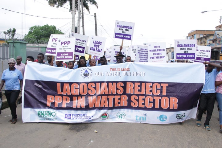 People protest public-private partnerships in Lagos on World Water Day.