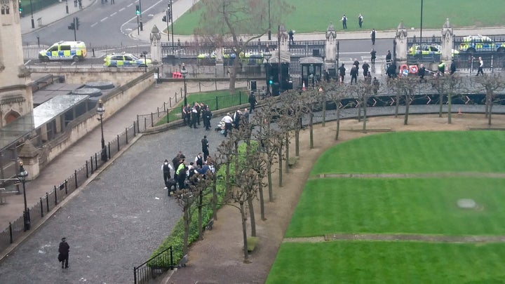 Crowds gathered around the main entrance to Parliament immediately after the attack