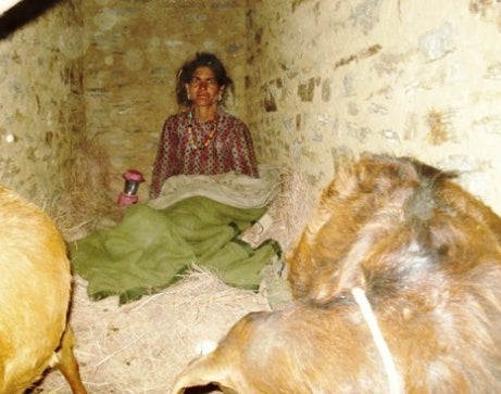 <p>A woman living inside a stone cowshed for the entire duration of her menstrual cycle.</p>