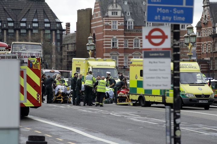 Vox.Com: “Emergency services staff provide medical attention close to the Houses of Parliament in London, Wednesday, March 22, 2017.”