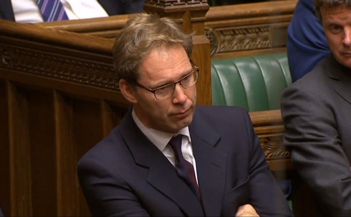 Ellwood listens to Theresa May's praise in the Commons today, as Parliament sat as normal