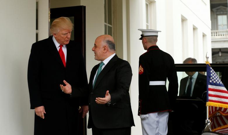 U.S. President Donald Trump greets Iraqi Prime Minister Haider al-Abadi at the White House in Washington, U.S., March 20, 201