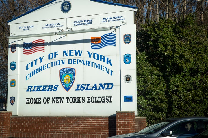 A car exits the Rikers Island Correctional Center in New York March 12, 2015.