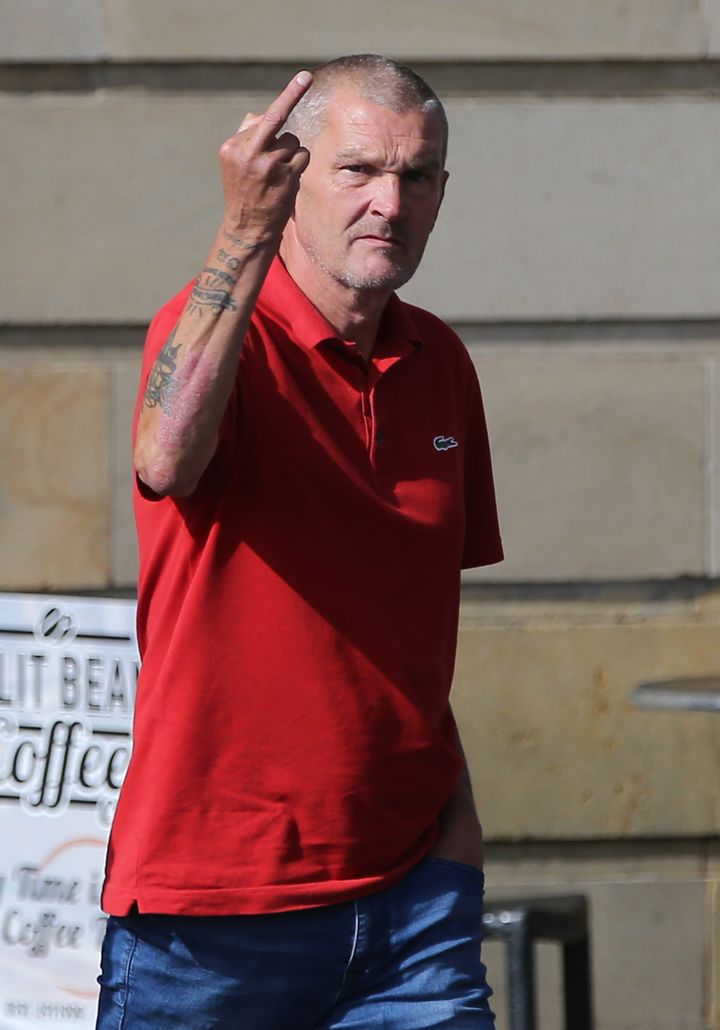 Peter Scotter gesturing at the media during an earlier appearance at Newcastle Crown Court 