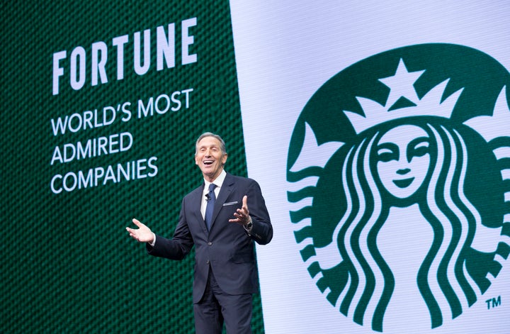 CEO Howard Schultz speaks during the Starbucks annual meeting of shareholders on Wednesday. He's stepping down this month as chief executive.