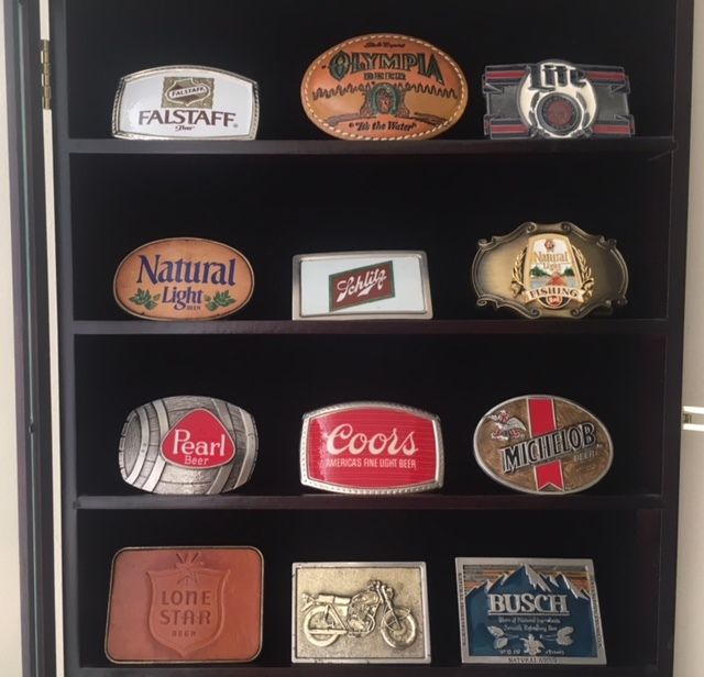This display case shows a few of the belt buckles in my collection.