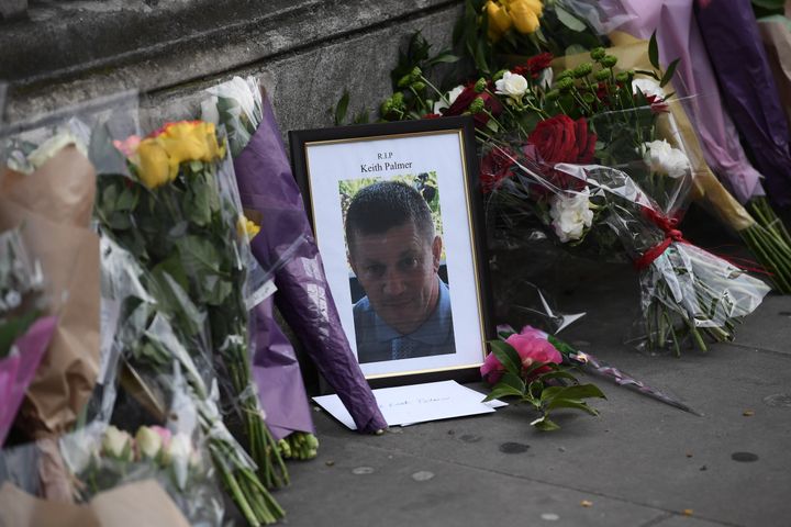 People left flowers at an impromptu memorial site for Police Constable Keith Palmer. 