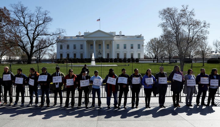 Twenty-four activists demonstrate against Obamacare repeal outside the White House. Police began arresting them after they refused to move.