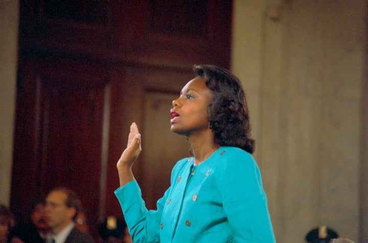 Professor Anita Hill is sworn-in before testifying at the Senate Judiciary hearing on the Clarence Thomas Supreme Court nomination. Miss Hill testified on her charges of alleged sexual harassment by Judge Thomas.