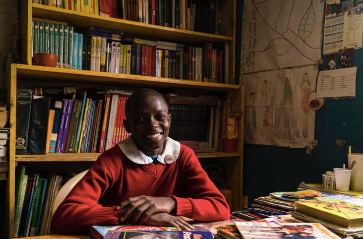A student sits in the library of the Kibera School For Girls in Nairobi, Kenya