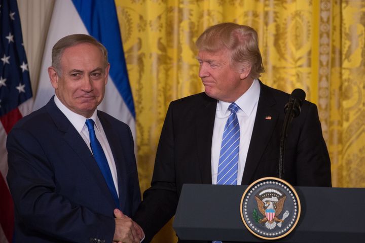 President Donald Trump, right, met with Israeli Prime Minister Benjamin Netanyahu last month and urged him to “hold back on settlements for a little bit.”