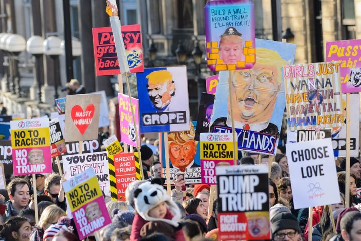 Demonstrators walk down Piccadilly during the Women's March on London on Jan. 21.